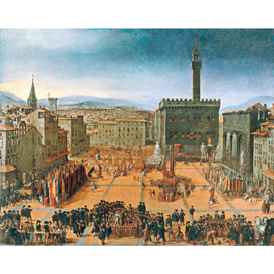 Florenz um 1300: Mit mehr als 90.000 Einwohnern gehört Florenz um 1300 zu den größten Städten Europas. Tuchhersteller, Händler und Bankiers sorgen für eine Geschäftigkeit, in der der Kapitalismus zum ersten Mal aufblüht. Die neue Elite zeigt ihren Wohlstand mit Prachtbauten wie dem 1314 vollendeten Palazzo della Signoria (heute Palazzo Vecchio, hinten rechts), dem Sitz der Stadtregierung, vor dem sich hier Menschen zu einem Festumzug versammelt haben