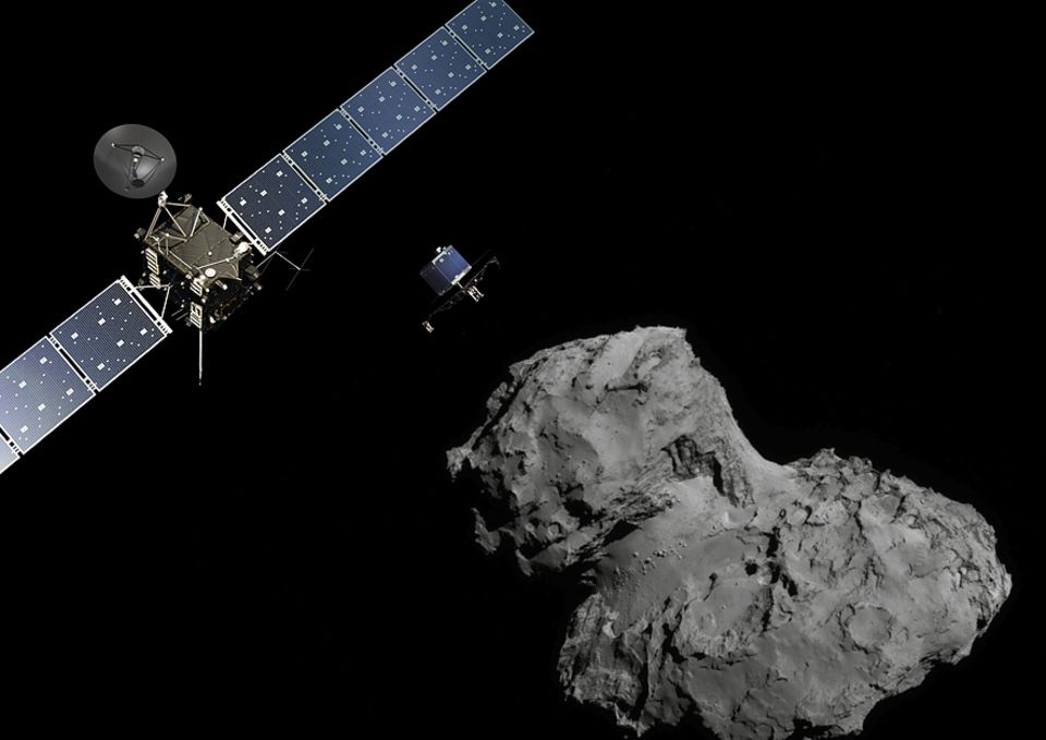 Raumsonde Rosetta: Der etwa waschmaschinengroße Lander Philae (Bildmitte) im Anflug auf "Tschuri". Links: Die Sonde Rosetta Raumsonde Rosetta: Der etwa waschmaschinengroße Lander Philae (Bildmitte) im Anflug auf "Tschuri". Links: Die Sonde Rosetta