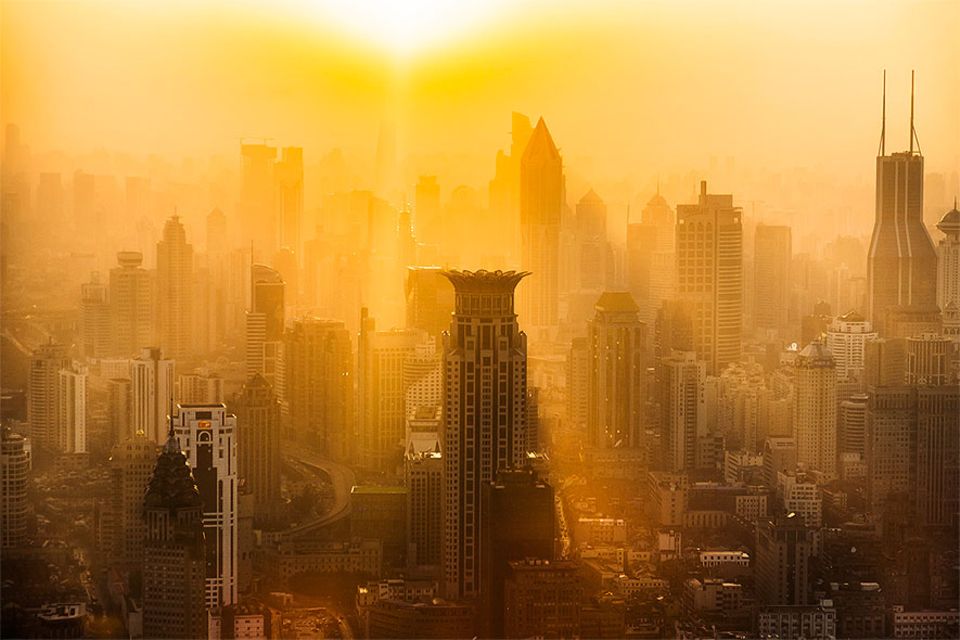 Klimawandel: Sonnenuntergang über Shanghai: Die Folgen des Klimawandels sind in den Großstädten schon jetzt zu spüren Klimawandel: Sonnenuntergang über Shanghai: Die Folgen des Klimawandels sind in den Großstädten schon jetzt zu spüren