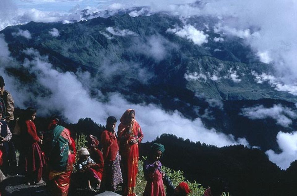 Den heiligen Berg Kalinchok, auf den die Pilger ziehen, haben Schamanen in ihren Visionen gefunden Den heiligen Berg Kalinchok, auf den die Pilger ziehen, haben Schamanen in ihren Visionen gefunden