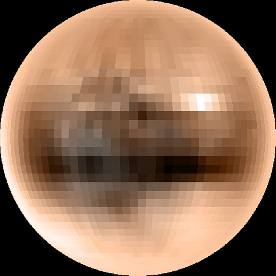 Das bisher schärfste Foto von der Pluto-Oberfläche. Die braune Farbe soll von gefrorenen Methanvorkommen herrühren