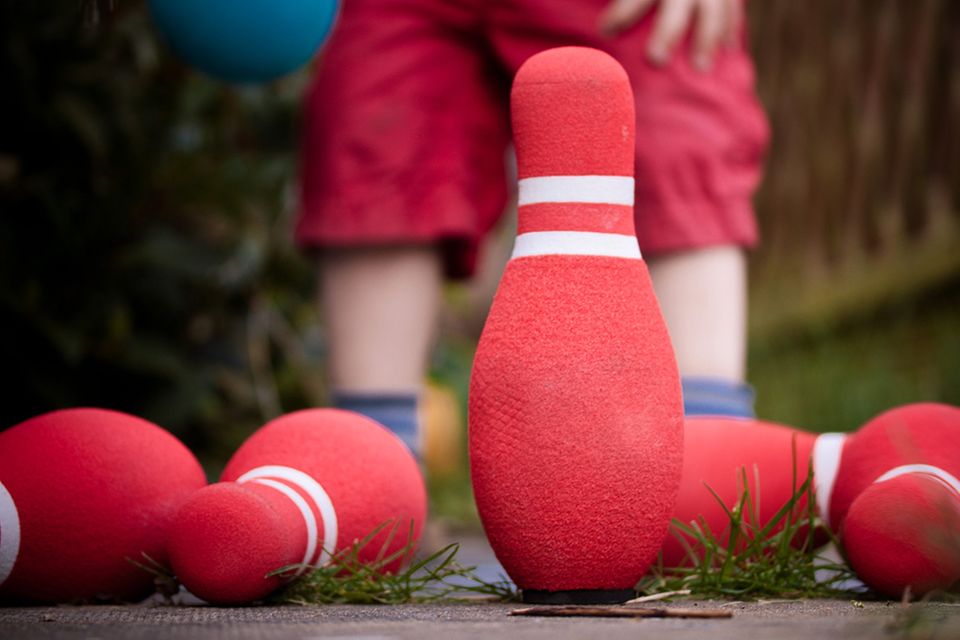 Redewendung: Mit Kind und Kegel