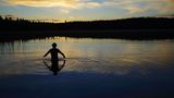 Bad im See in Finnland