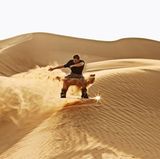 Sandboarden in der Wüste