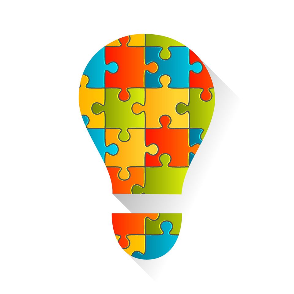 Glühbirne aus Puzzleteilen