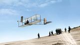 Wilbur und sein Bruder Orville Wright wagen erste Gleitflüge
