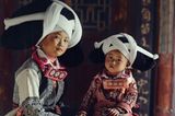 Der Kopfschmuck der Langhorn-Miao-Frauen im Süden Chinas erinnert an das Gehörn von Wasserbüffeln