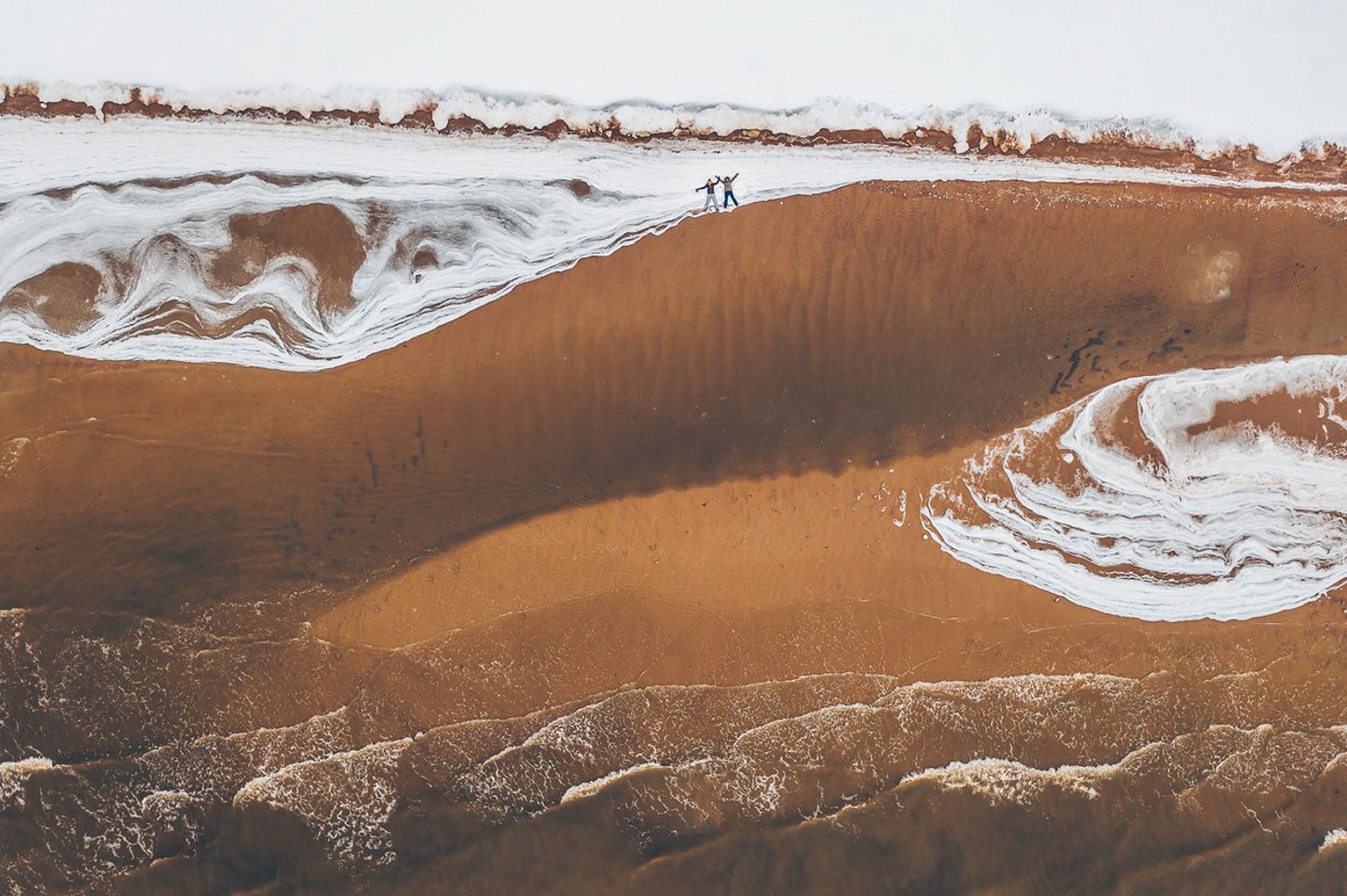 Standing on the edge of the Baltic sea coast
