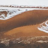 Standing on the edge of the Baltic sea coast