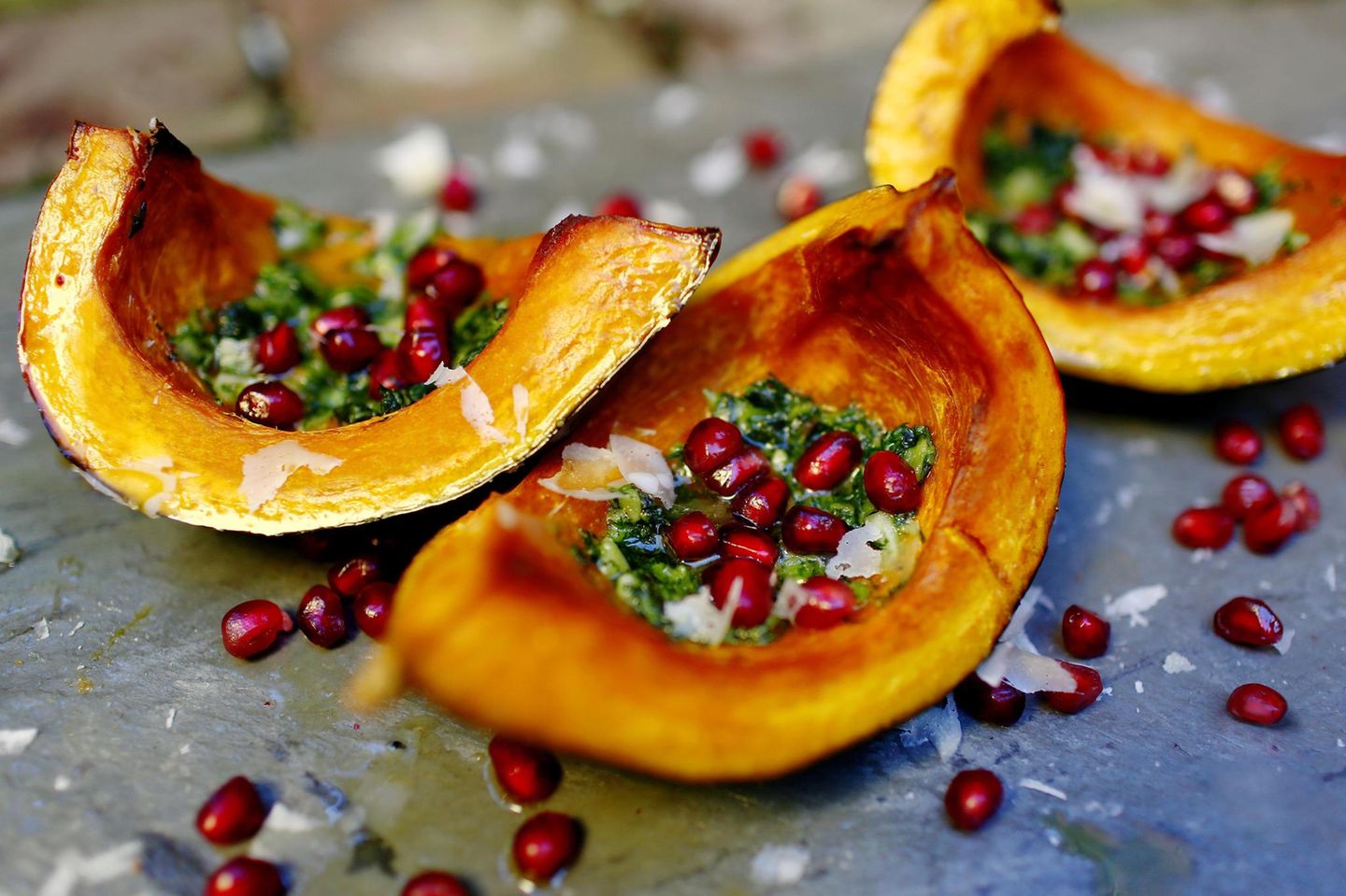Roasted squash with pomegranate seeds and homemade pesto
