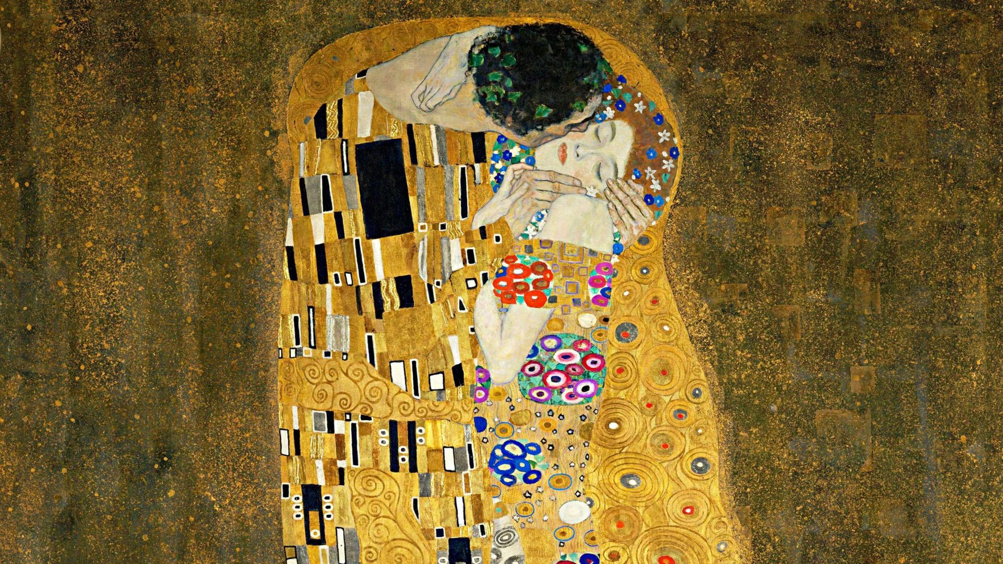 "Der Kuss" von 1908. In die Aura glänzenden Goldes gehüllt, erlebt ein Liebespaar einen Augenblick kosmischer Innigkeit – ein entrücktes Traumbild in Klimts Œuvre, das aber auch reich an Albträumen ist