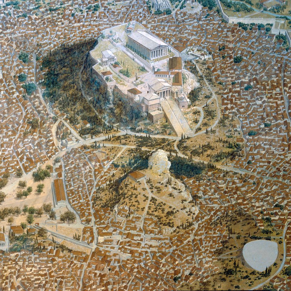 Nahe dem Felsen der Akropolis liegt ein »Pnyx« genanntes natürliches Halbrund, in dem die Bürgerversammlungen stattfinden. Doch unter den Tausenden Teilnehmern fehlen viele Bewohner Athens: Frauen, Zuwanderer und Sklaven sind ausgeschlossen