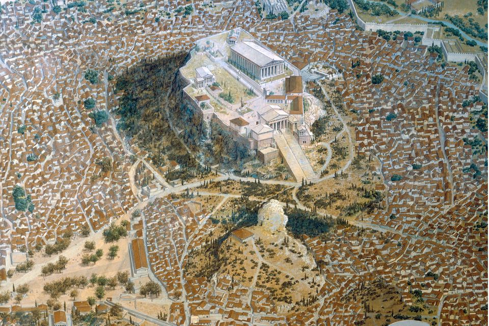 Nahe dem Felsen der Akropolis liegt ein »Pnyx« genanntes natürliches Halbrund, in dem die Bürgerversammlungen stattfinden. Doch unter den Tausenden Teilnehmern fehlen viele Bewohner Athens: Frauen, Zuwanderer und Sklaven sind ausgeschlossen