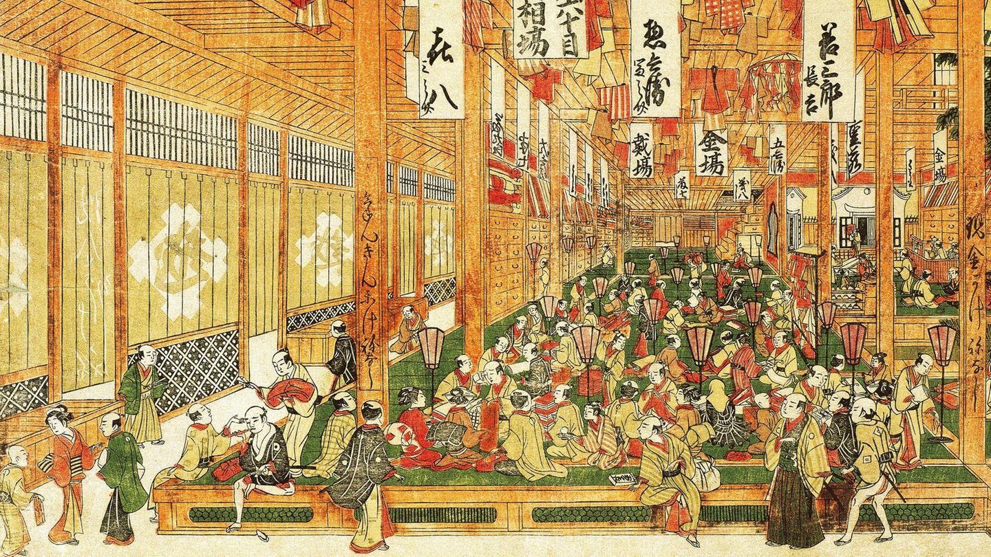 Geo-Epoche_21_090_B0.tif In den Hallen des großen Tuch- und Kleidungsgeschäfts Mitsui kümmern sich Dutzende Verkäufer um die Kundschaft. Fertig geschneiderte Kimonos hängen als Musterstücke von der Decke. Nicht wenige Geschäftsleute machen in Edo ein Vermögen. In der offiziellen Hierarchie der Gesellschaft stehen sie jedoch ganz unten