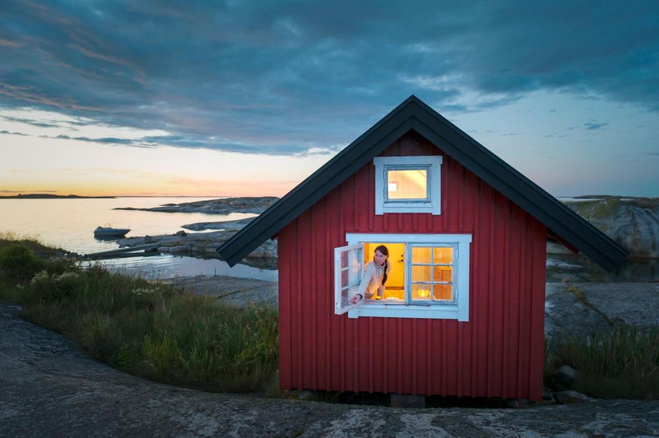 In der idealisierten Hygge-Welt werden alle möglichen Elemente des Nordens vermengt: von Kerzen, Gebäck, Möbeln bis zu "falunroten" Schwedenhäusern Nordromantik