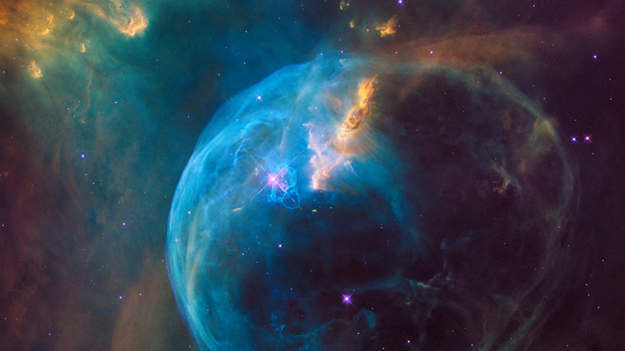 Kosmischer Kreislauf: Hier schleudert ein junger Stern (Mitte, etwa bei zehn Uhr, glitzernd) gewaltige Mengen an Gas (blau) ins All. Darunter auch Substanzen, die zuvor in seinem Inneren entstanden sind und nun als Rohmaterial für neue Himmelskörper dienen