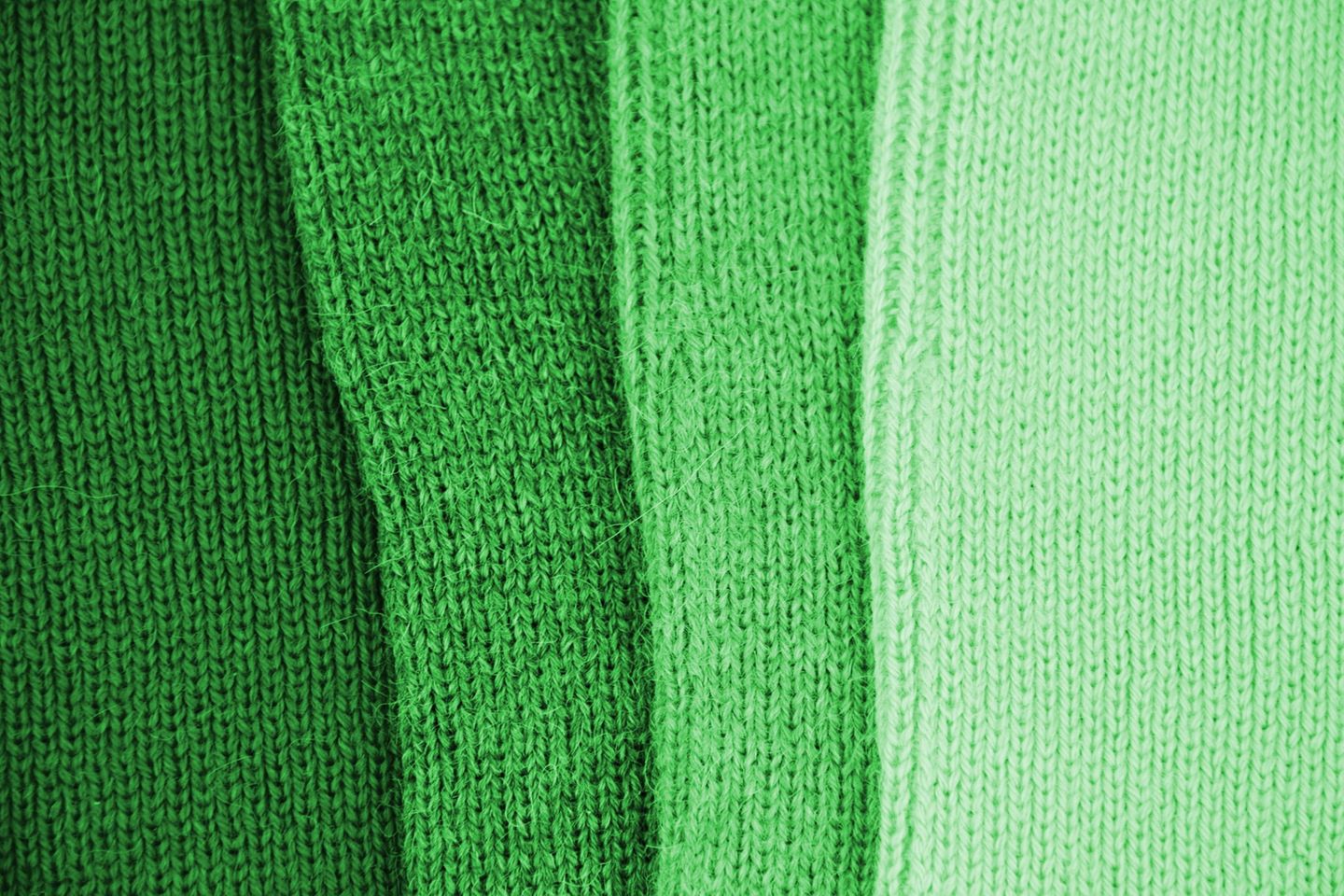 Gestrickte Textur in grünen Farbtönen