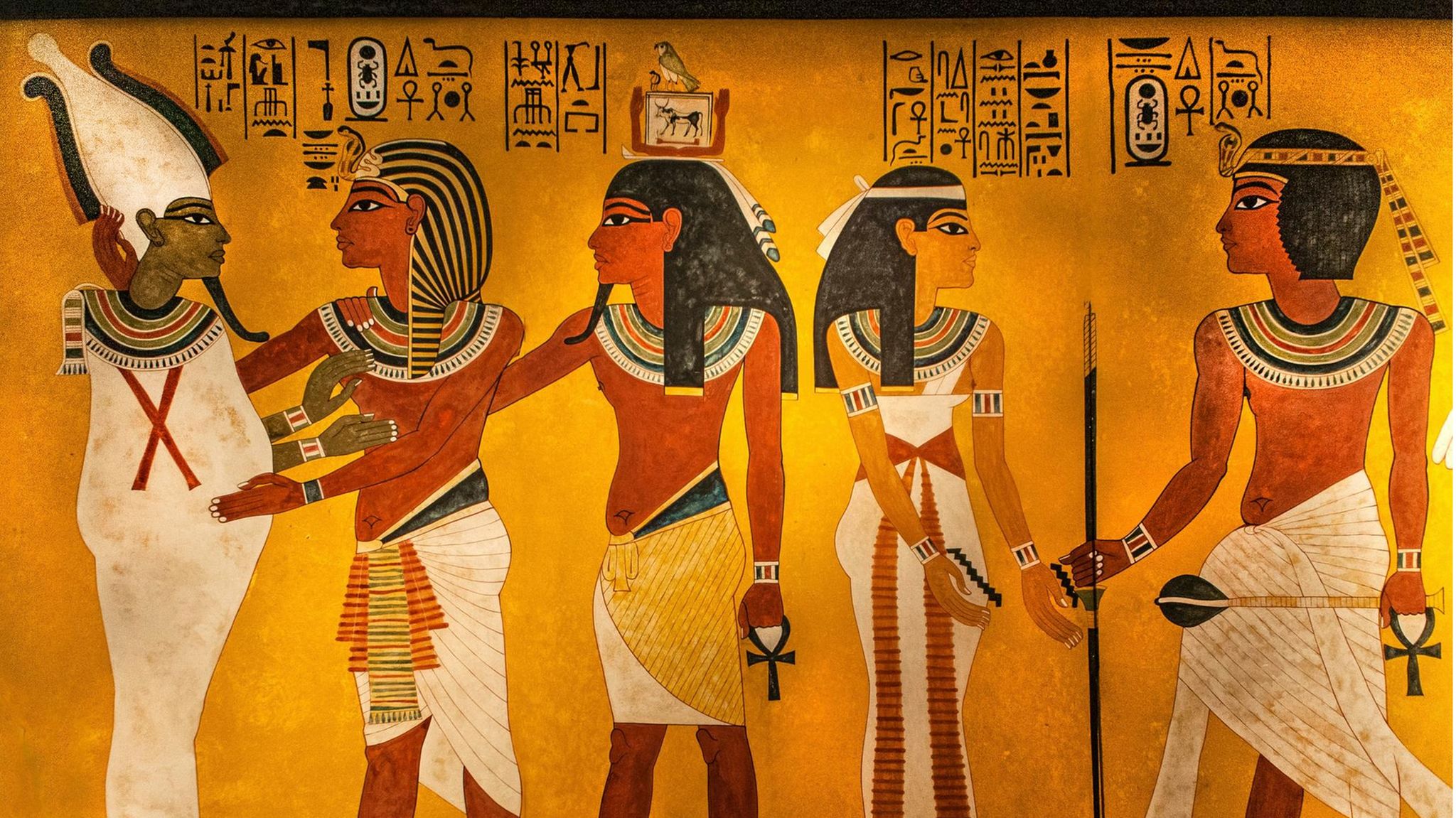 Die grüne, an Papyruspflanzen erinnernde Hautfarbe des Unterweltherrschers Osiris (l.) steht für seine Leben spendende Kraft, die aus dem Tod neues Dasein schafft