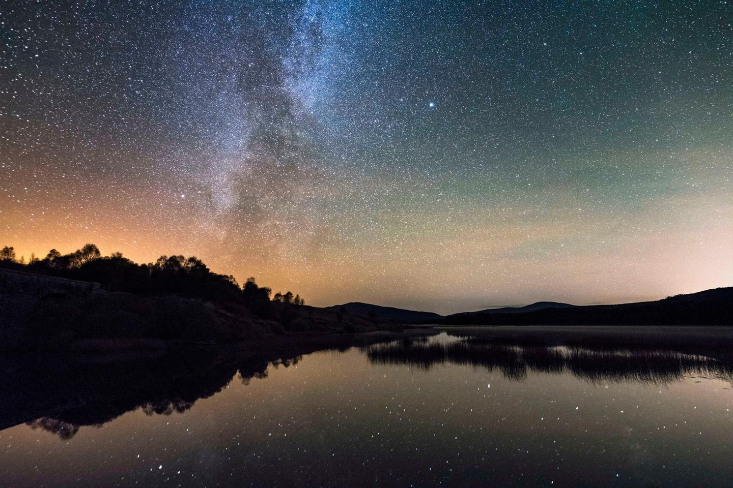 Milky Way and stars over Loch Stroan, Galloway Dark Sky Park, Galloway Forest, Dumfries & Galloway, Scotland