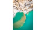 Image Name: Turquoise Lake  Photographer Name: Marcin Giba  Year: 2022  Image Description: <p>I took this photo of a turquoise lake in Poland with a drone in Autumn 2021. Let us not be deceived by the blue colour of the water, or the colour of the sand. It is the result of human activity interfering with the natural environment. You cannot bathe in this lake, and the water is poisonous.</p>  Copyright: © Marcin Giba, Poland, Winner, National Awards, Landscape, 2022 Sony World Photography Awards
