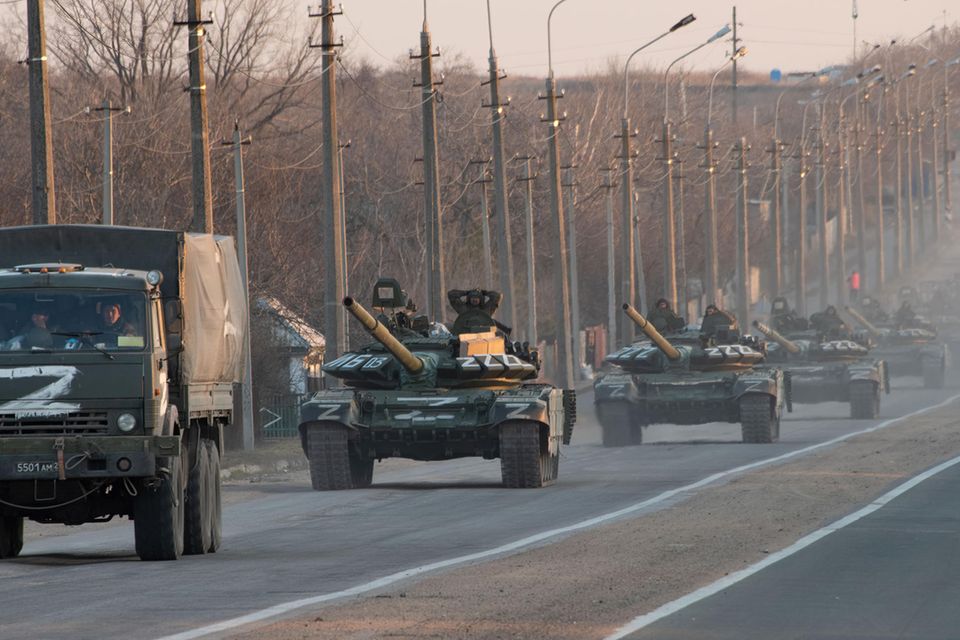 March 23, 2022, Mariupol, Ukraine: A column of tanks marked with the Z symbol stretches into the distance as they proceed northwards along the Mariupol-Donetsk highway. The battle between Russian / Pro Russian forces and the defencing Ukrainian forces lead by Azov battalion continues in the port city of Mariupol.