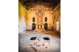 Photo 8: This church is part of an abandoned monastery with a very long history, located in Northern Italy. Founded in the Middle Ages, near the end of the 12th century, and occupied for about 600 years. Near the end of the 18th century it got closed due to constant complaints of the critical condition of the building. Striking for the current state of the complex is the huge amount of vandalism, and in particular this church which is only a small part of the complex. The archeologic value is quite high. Historic pottery, wooden coffins and nails got destroyed and people have even tried to steal the big marmer Roman column in the altar you see on the picture. The heavy weight of the column probably prohibited the thieves to take it.