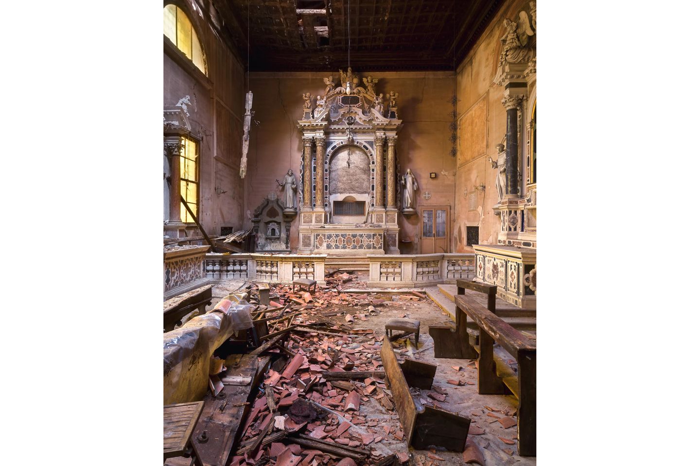 Photo 9: This is a photo of an amazing abandoned church which is part of an abandoned monastery, located in Northern Italy. The monastery has been founded in the beginning of the 17th century. It was closed about 200 years later. The building was later used as a school and as a hospital. The courtyard of this place was lovely to walk around in. Unfortunately it's been closed since a few decades. 