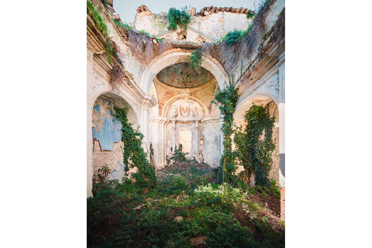 Photo 5: Located in the Abruzzo region, and damaged by an earthquake. The church has been long abandoned, and is being taken over by nature as you can clearly see in the photo.