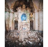 Photo 1: Located in the proximity of the city of Naples. The structure is internally completely covered with scaffolding, to prevent the walls from falling down. 