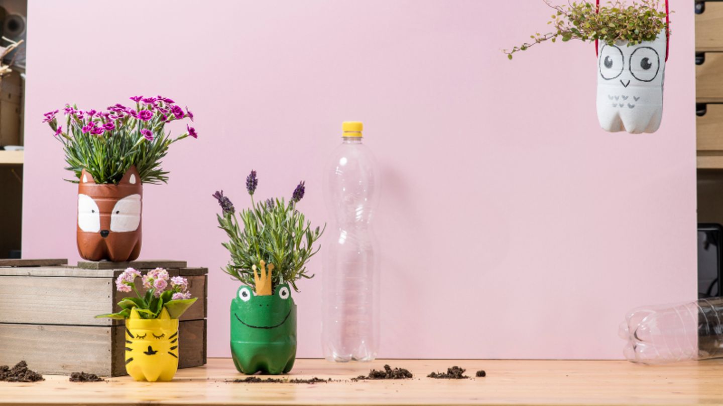 Selbstgemachte Blumentöpfe aus Plastikflaschen mit Tiermotiven