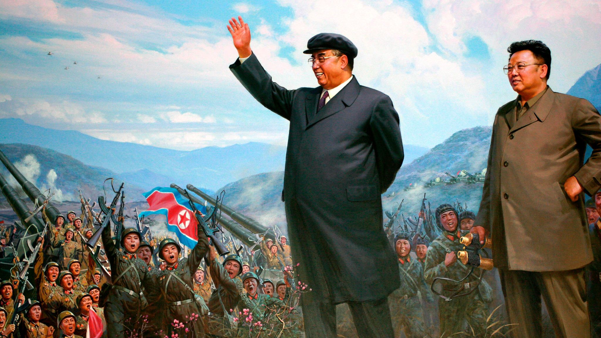 Propagandaplakat: Kim Il-sung (l.) und sein Sohn und Nachfolger Kim Jong-il lassen sich als Staatenlenker darstellen, die von den Soldaten gefeiert werden