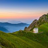 Val Grande, Piedmont, Italy. Landscape with mountain hut at sunrise.