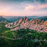 Aerial view of Pietrapertosa rural village in Apennines Dolomiti Lucane. Basilicata, Italy, at sunset