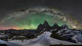 GOLD: JAKE MOSHER, USA  On June 17th, 2021, I hiked, snowshoed, and climbed to the 11,000-foot summit of Wyoming's Table Mountain to photograph the Milky Way over Grand Teton Peak. While these iconic mountains have been photographed tens of thousands of times, I wanted to show an entirely unique view of them. I was treated to one of the most spectacular displays of airglow that I've ever seen - similar to the aurora and created by photo-charged particles, but spanning much of the horizon.