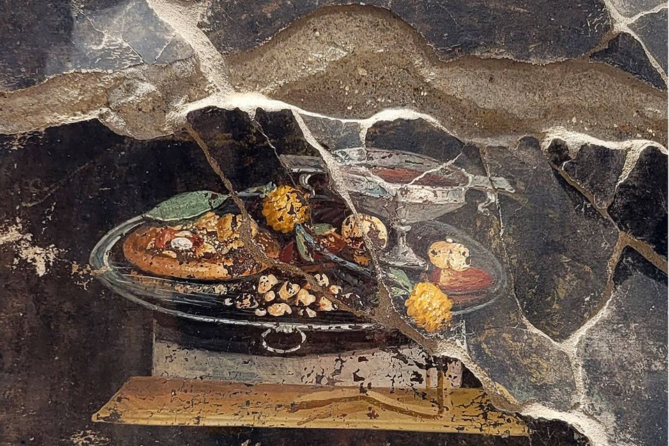 Das nun in Pompeji freigelegte Fresko zeigt einen appetitlichen Teigfladen, wenn auch noch ohne die klassischen Tomaten und Mozzarella