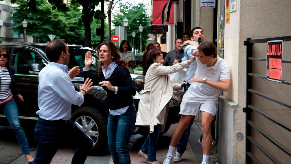 Tumult auf einer Straße in Madrid Tumult auf einer Straße in Madrid