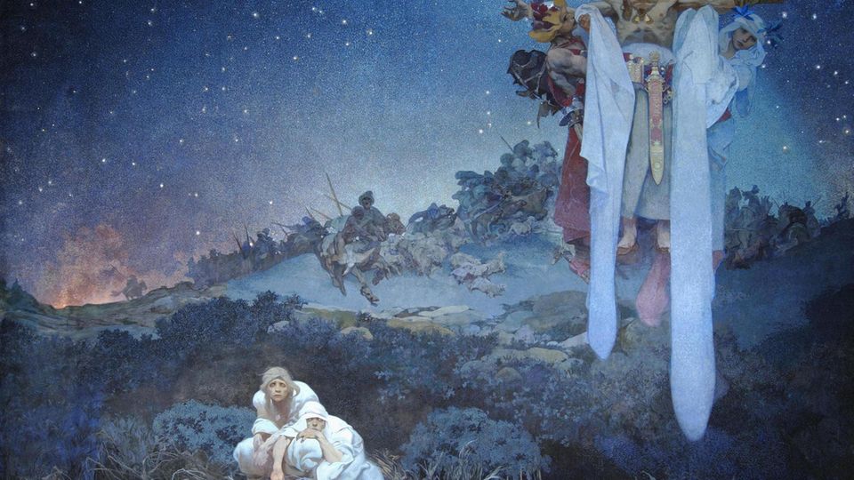 Nachtszene in der Urheimat der Slawen. Zwei Bäuerinnen kauern vor einem Haufen Stroh. Über ihnen thront ein heidnischer Priester