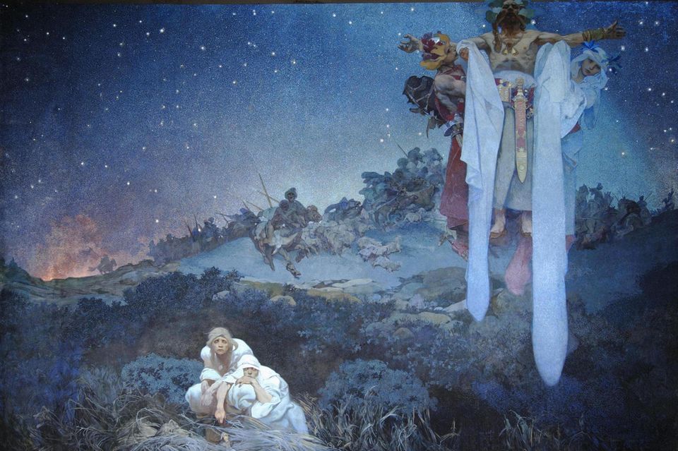 Nachtszene in der Urheimat der Slawen. Zwei Bäuerinnen kauern vor einem Haufen Stroh. Über ihnen thront ein heidnischer Priester
