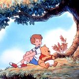 Pu der Bür und Christopher Robin sitzen unter einem Baum. Szene aus einem Zeichentrickfilm von 1988