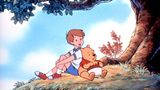 Pu der Bür und Christopher Robin sitzen unter einem Baum. Szene aus einem Zeichentrickfilm von 1988