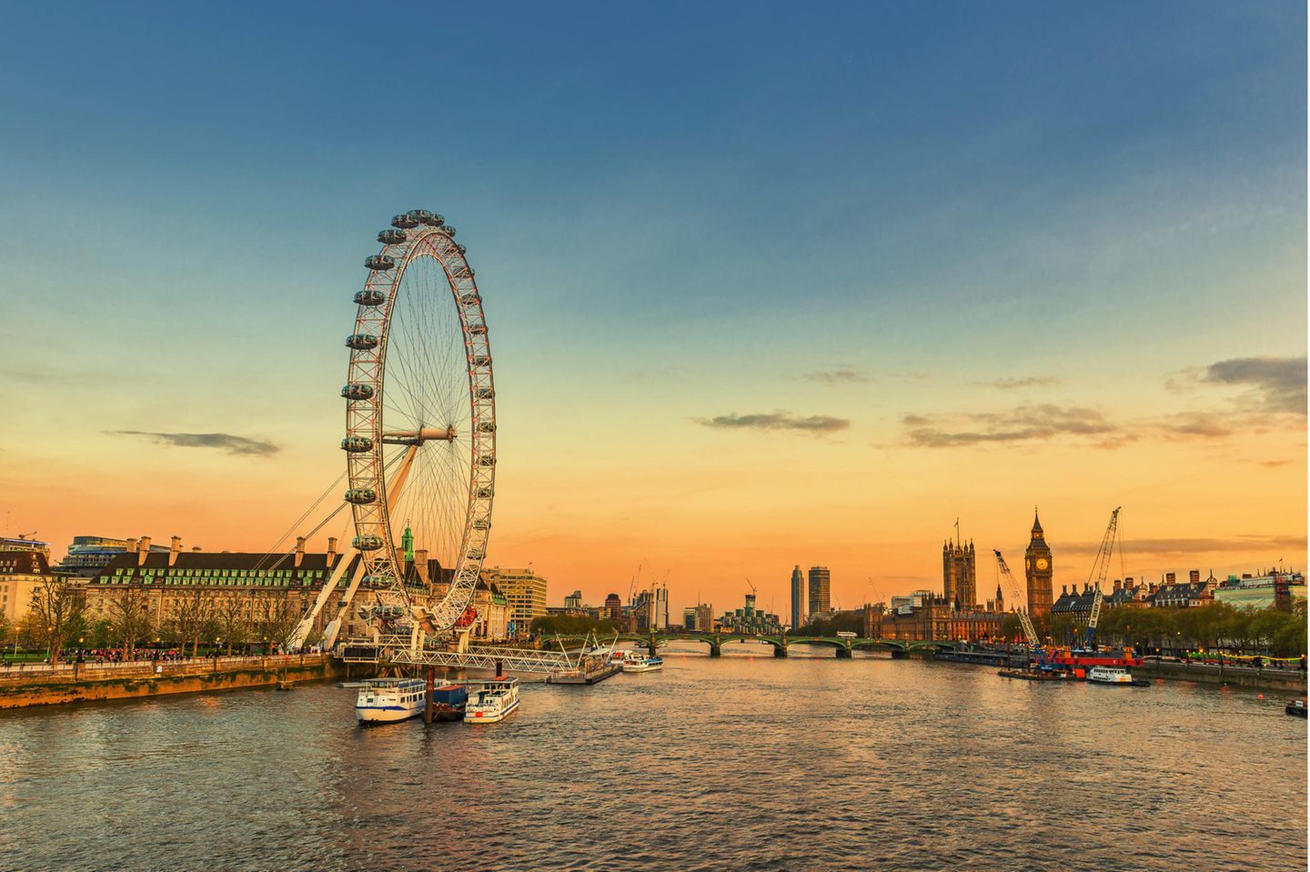 London Eye in London Sunset of the thames river in london
