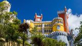 Palace of Pena in Sintra. Lisbon, Portugal. Travel Europe, holidays in Portugal. Panoramic View Of Pena Palace, Sintra, Portugal. Pena National Palace, Sintra, Portugal.