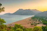 Beautiful sunset view of the Cirali Olympos beach at Mediterranean sea, Antalya, Turkey