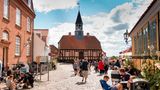 =Ebeltoft, Denmark - 20 July 2020: Many people on the old pedestrian street, People are out shopping, shops along the pedestrian street, The old ebelto City=Ebeltoft Object Name=2G517D5 Original Transmission Reference=20231101183738 Source=www.mauritius-images.com Caption Writer/Editor=mauritius Images, Germany Credit=mauritius images / Alamy Stock P Copyright Notice=