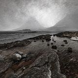 Winner Grand Scenic - During an unusual warm period for a Northern Norway winter a stromfront hit the coast of Steigen with it´s towering mountains. Hiding the van from the raging winds I found shelter close to a tidal island . When it suddenly started snowing with extremly large snow flakes I was sure that this would be perfect for a longer exposure shot with snow streaks and so I walked to the rocky edge of the tidal island to take the shot.