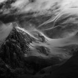 Winner Mountains - This is the "Mont Maudit" mountain in Mont Blanc massif, Chamonix, French alps. High-altitude strong winds create these very fine orographic clouds that change their appearance very rapidly. The also special light of the moment contributes to the slightly surreal atmosphere of the image.