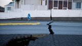 Caption/Abstract=A fissure stretches across a road in the town of Grindavik, Iceland Monday Nov. 13, 2023 following seismic activity. Residents of Grindavik, a town in southwestern Iceland, have been briefly allowed to return to their homes on Monday after being told to evacuate on Saturday after increasing concern about a potential volcanic eruption caused civil defense authorities to declare a state of emergency in the region. (AP Photo/Brynjar Gunnarsson)