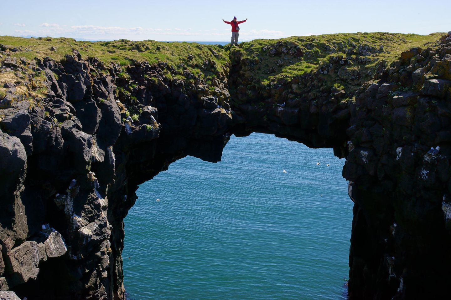 Rock arch on cliff at Arnarstapi nature preserve, Snaefellsness Peninsula, Iceland