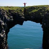 Rock arch on cliff at Arnarstapi nature preserve, Snaefellsness Peninsula, Iceland