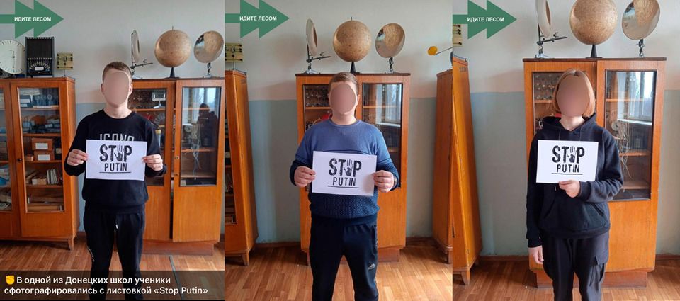 Drei anonymisierte junge Menschen mit selbstgemachtem A4 Papier mit der Aufschrift "Stop Putin"